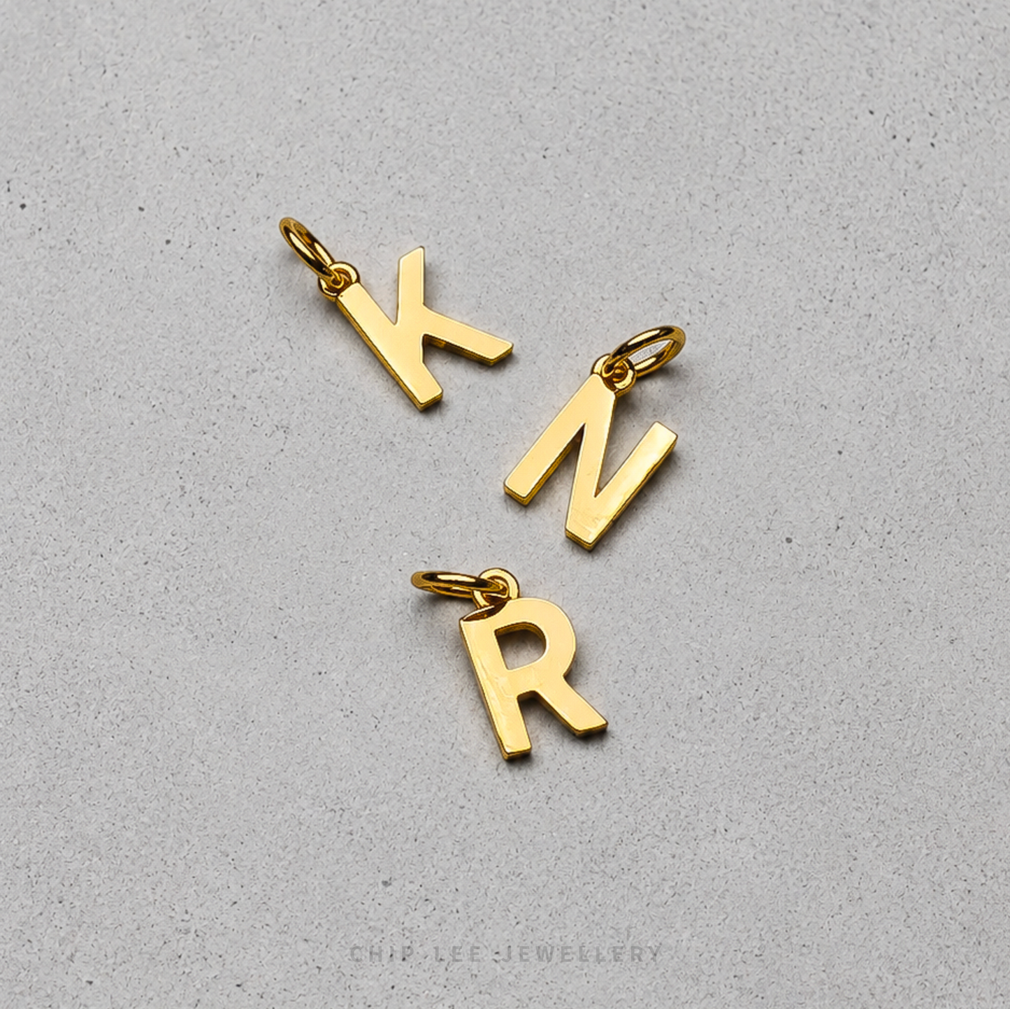 Polished Gold Letter Alphabet Pendants with Minimalist Design