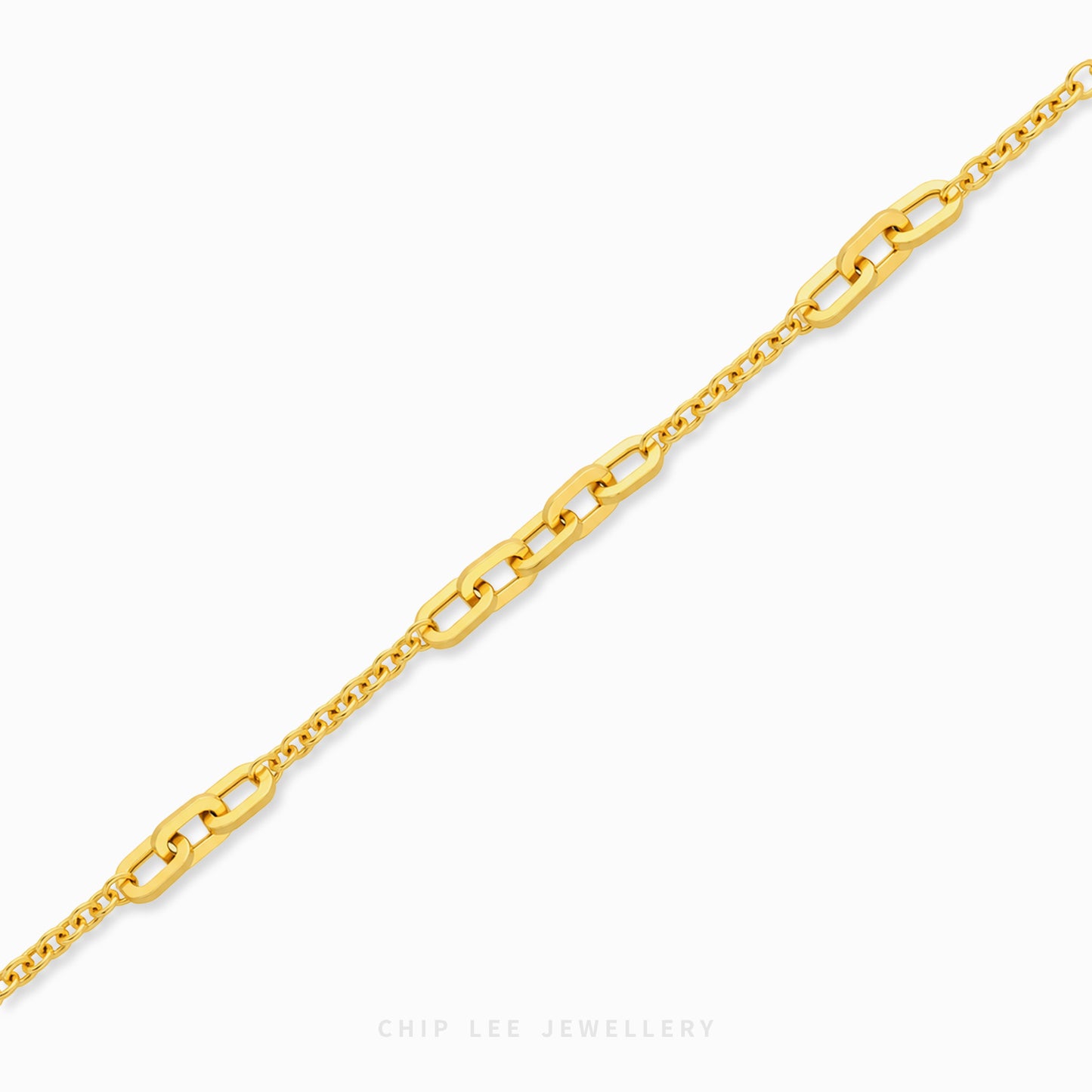 Amara Bracelet with alternating elongated rectangular links and delicate oval chains, finished with a lobster clasp and adjustable chain.