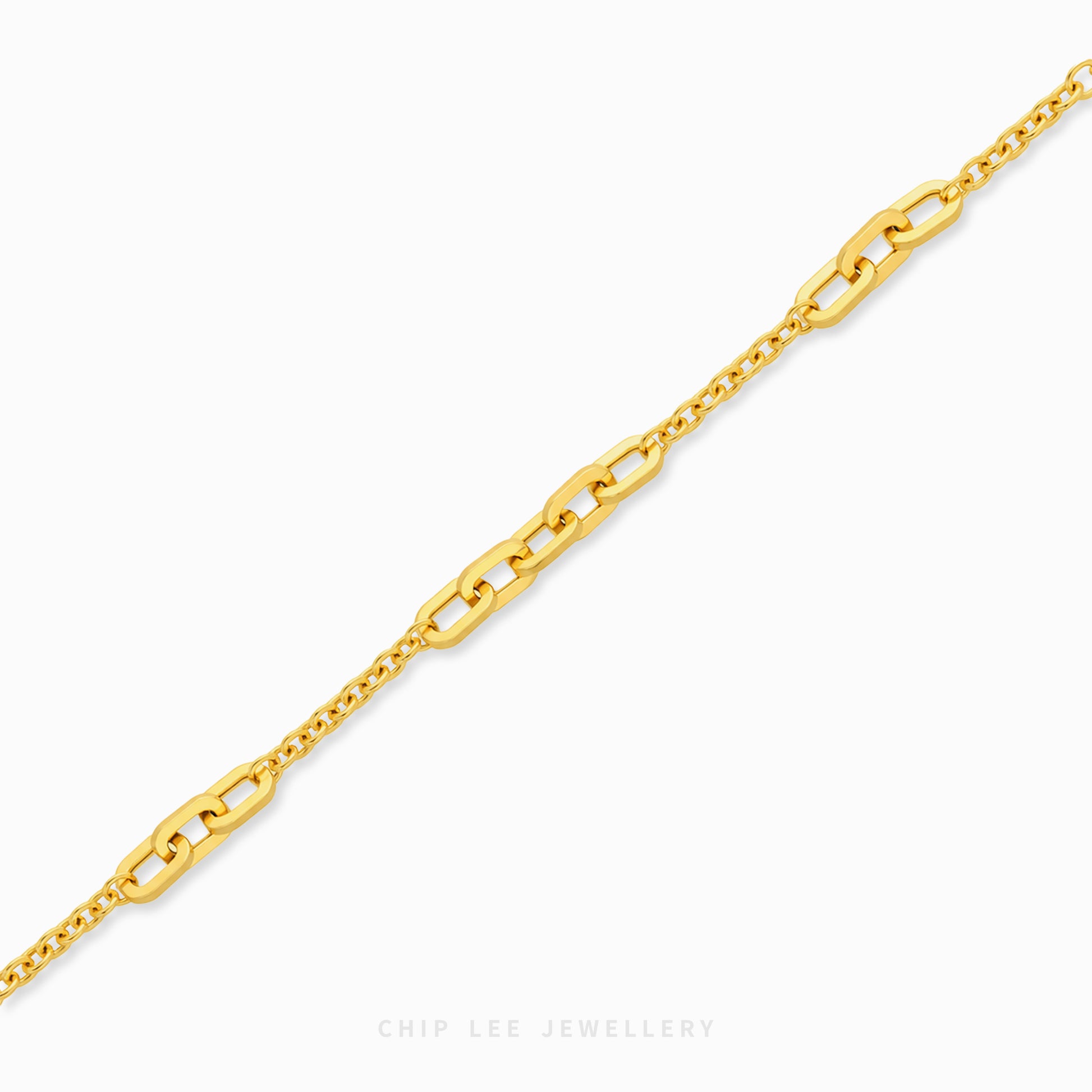 Amara Bracelet with alternating elongated rectangular links and delicate oval chains, finished with a lobster clasp and adjustable chain.
