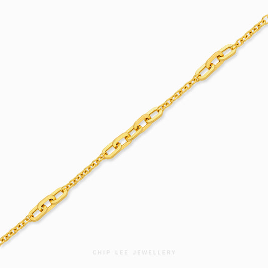 Amara Bracelet with alternating elongated rectangular links and delicate oval chains, finished with a lobster clasp and adjustable chain.