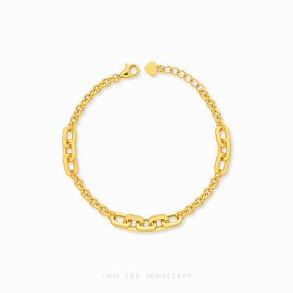 Amara Bracelet with alternating elongated rectangular links and delicate oval chains, finished with a lobster clasp and adjustable chain.