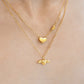 Shop the graceful Angel Wings Heart Necklace from Chip Lee Jewellery Singapore. This certified 916 Gold (22K) piece features a beautiful heart pendant with angelic wings, symbolising love and protection.