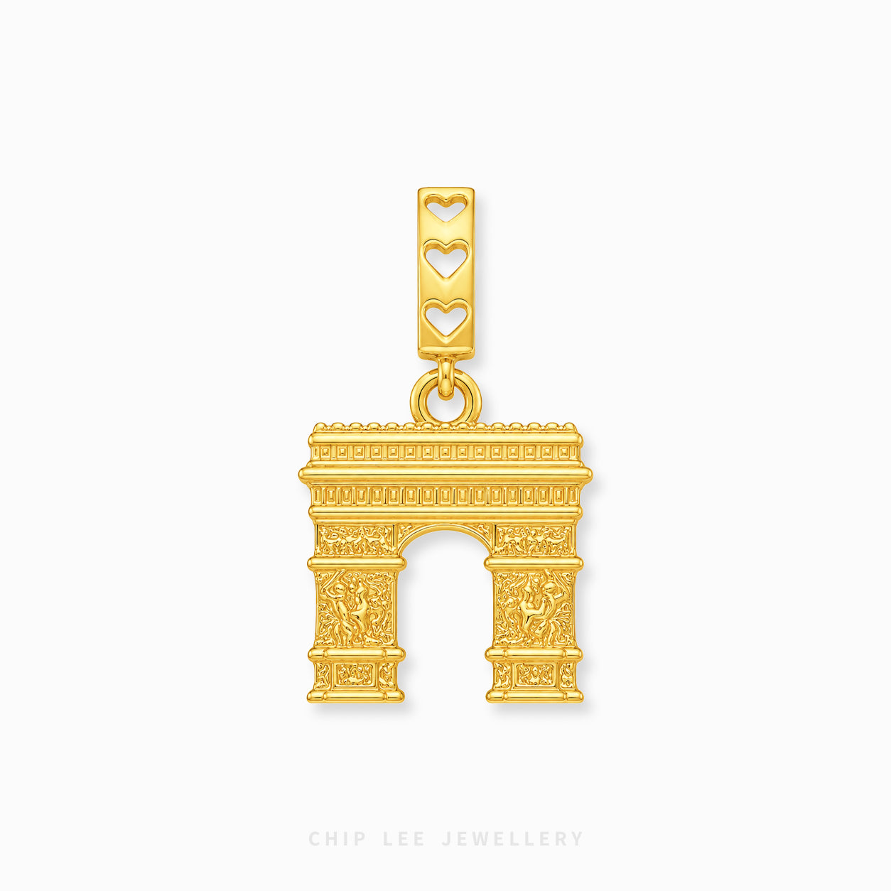 A gold-toned Arc de Triomphe charm with three heart-shaped cutouts on the bail, shown on a light gray background with Chip Lee Jewellery branding at the bottom.