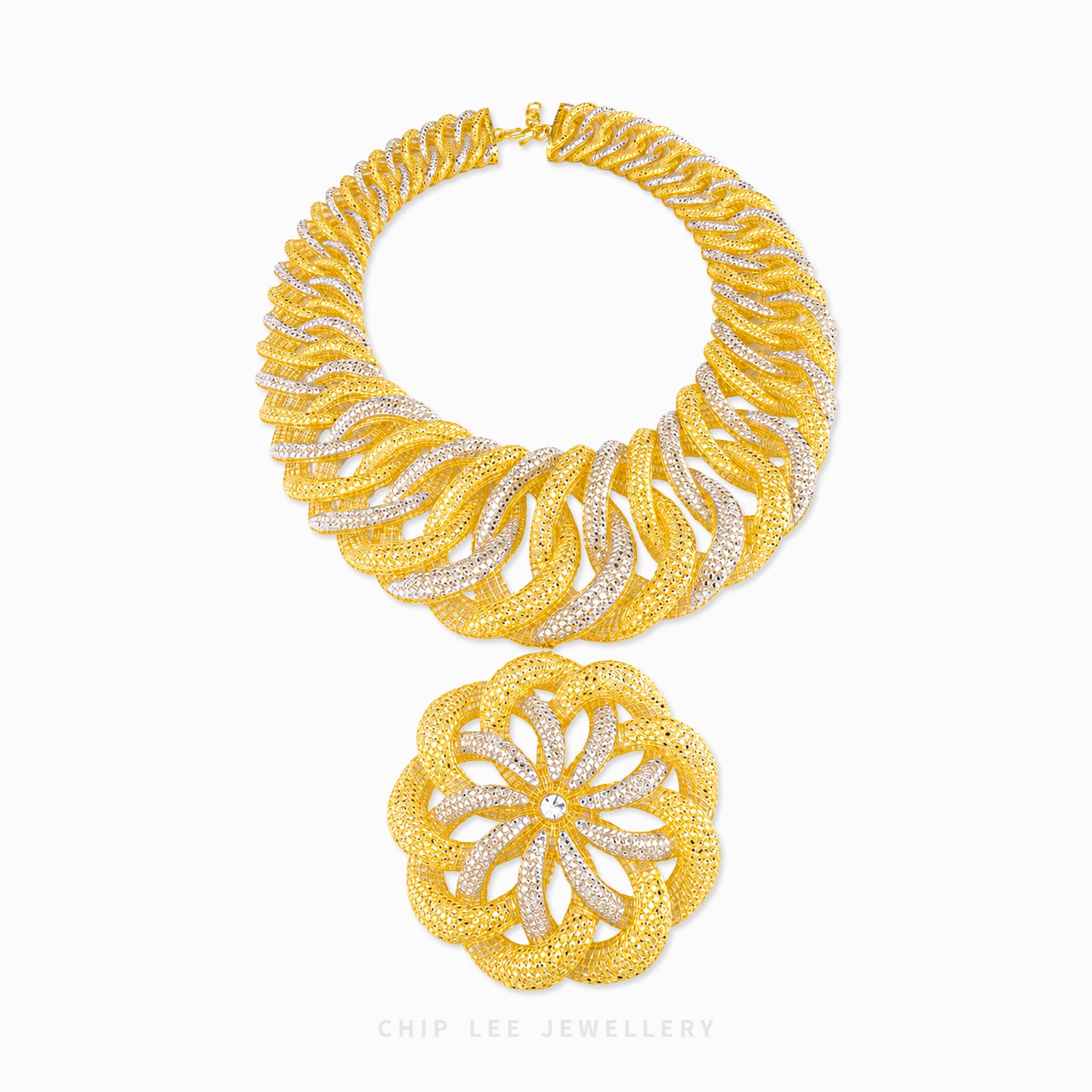 A gold and silver pavé necklace set by Chip Lee Jewellery, featuring a wide collar-style necklace and a matching round pendant, displayed on a clean white background.