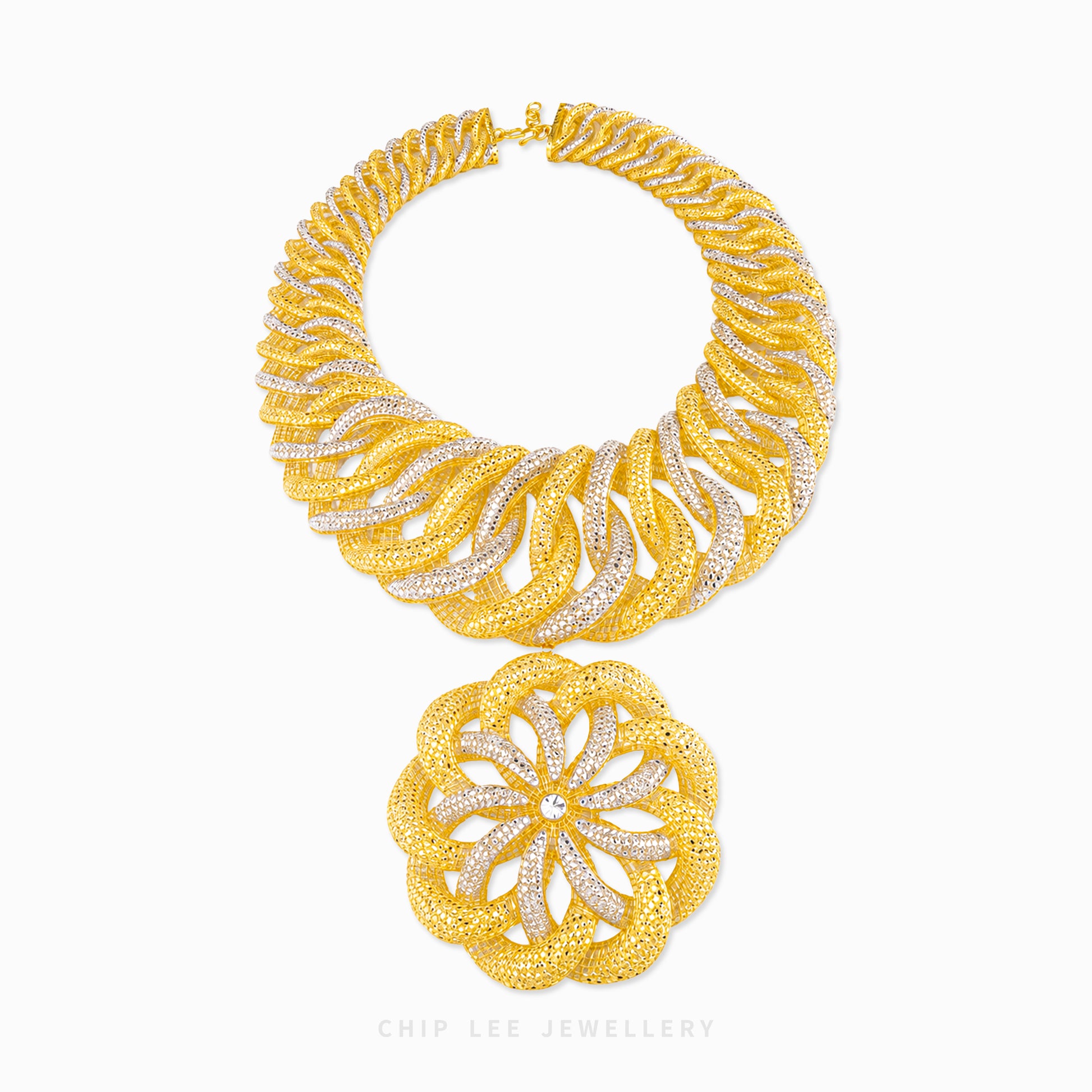 A gold and silver pavé necklace set by Chip Lee Jewellery, featuring a wide collar-style necklace and a matching round pendant, displayed on a clean white background.