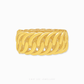 Gold bangle with intricate design on a white background
