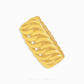 Gold bangle with wavy design on a white background