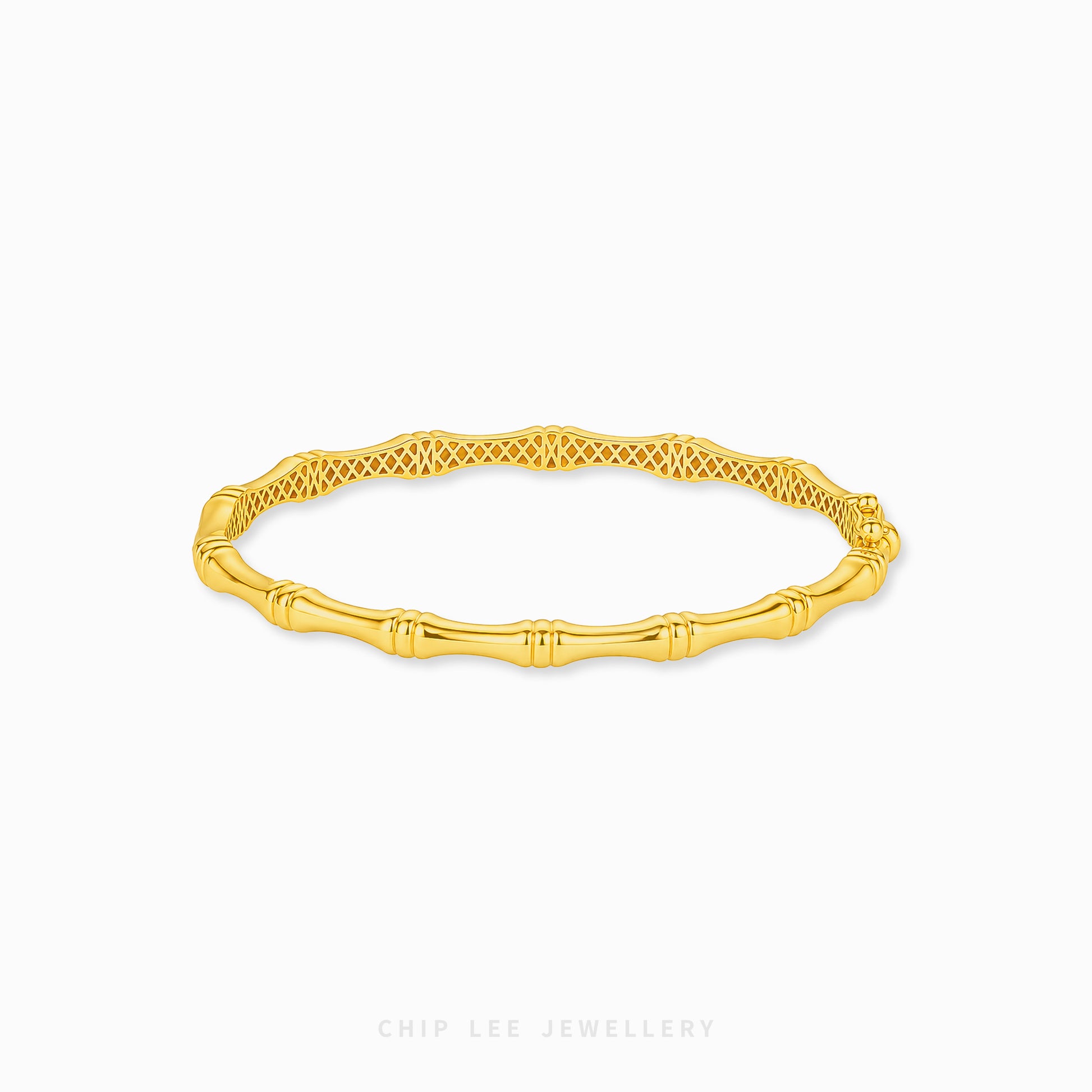 A gold bangle bracelet with a textured bamboo-inspired design on one side and a woven pattern on the other, shown on a light gray background with the brand name 'CHIP LEE JEWELLERY' at the bottom.