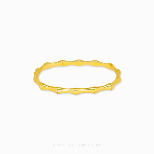 Bamboo Bangle by Chip Lee Jewellery Singapore, certified 916 gold with bamboo-inspired texture, rugged angular design, bold luxury wristpiece