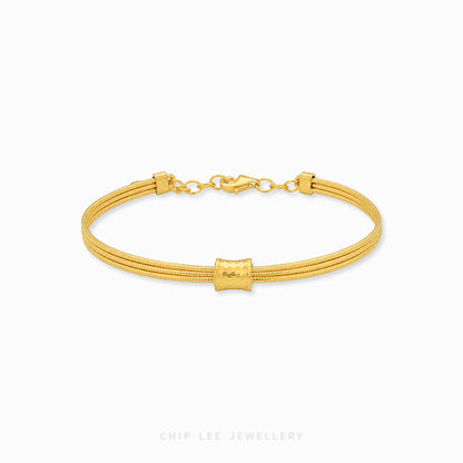 999 gold barrel triple rope bracelet in 24K pure gold with structured barrel centerpiece