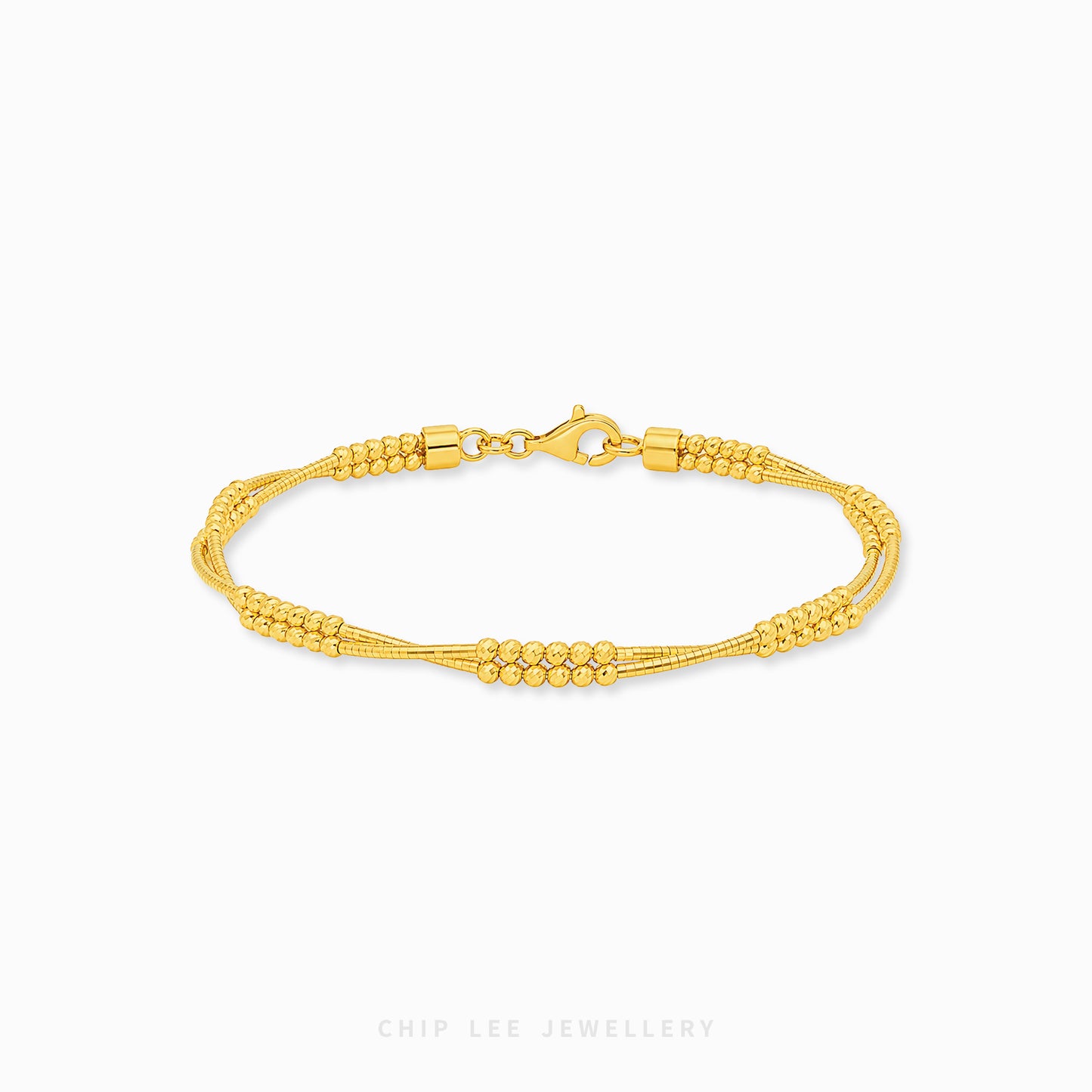 A gold multi-strand beaded chain bracelet with a lobster clasp, displayed on a clean white background with a faint 'CHIP LEE JEWELLERY' watermark at the bottom.
