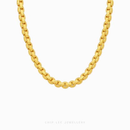 Bold gold box link chain necklace with geometric interlocking links and polished finish.