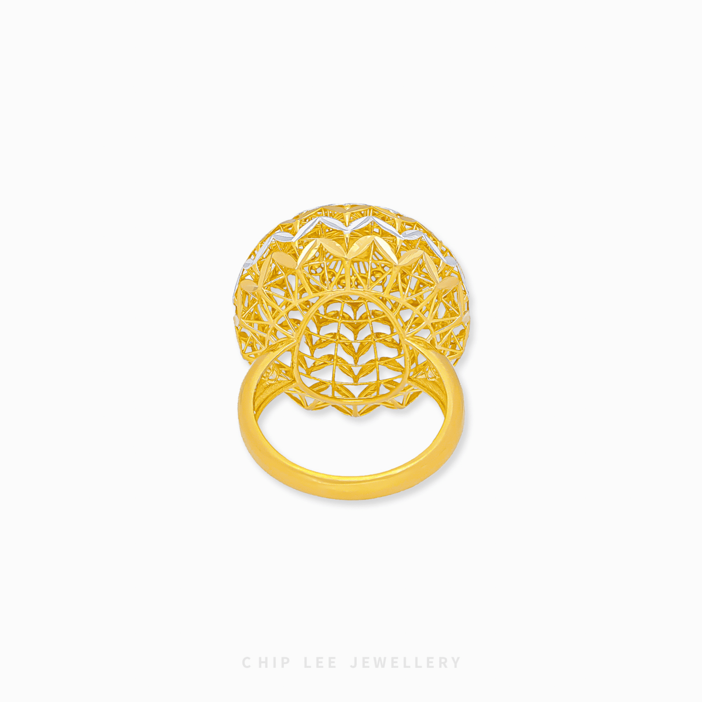 Bold Oracle Ring with intricate detailing, polished gold textures, and a striking, contemporary design for women.
