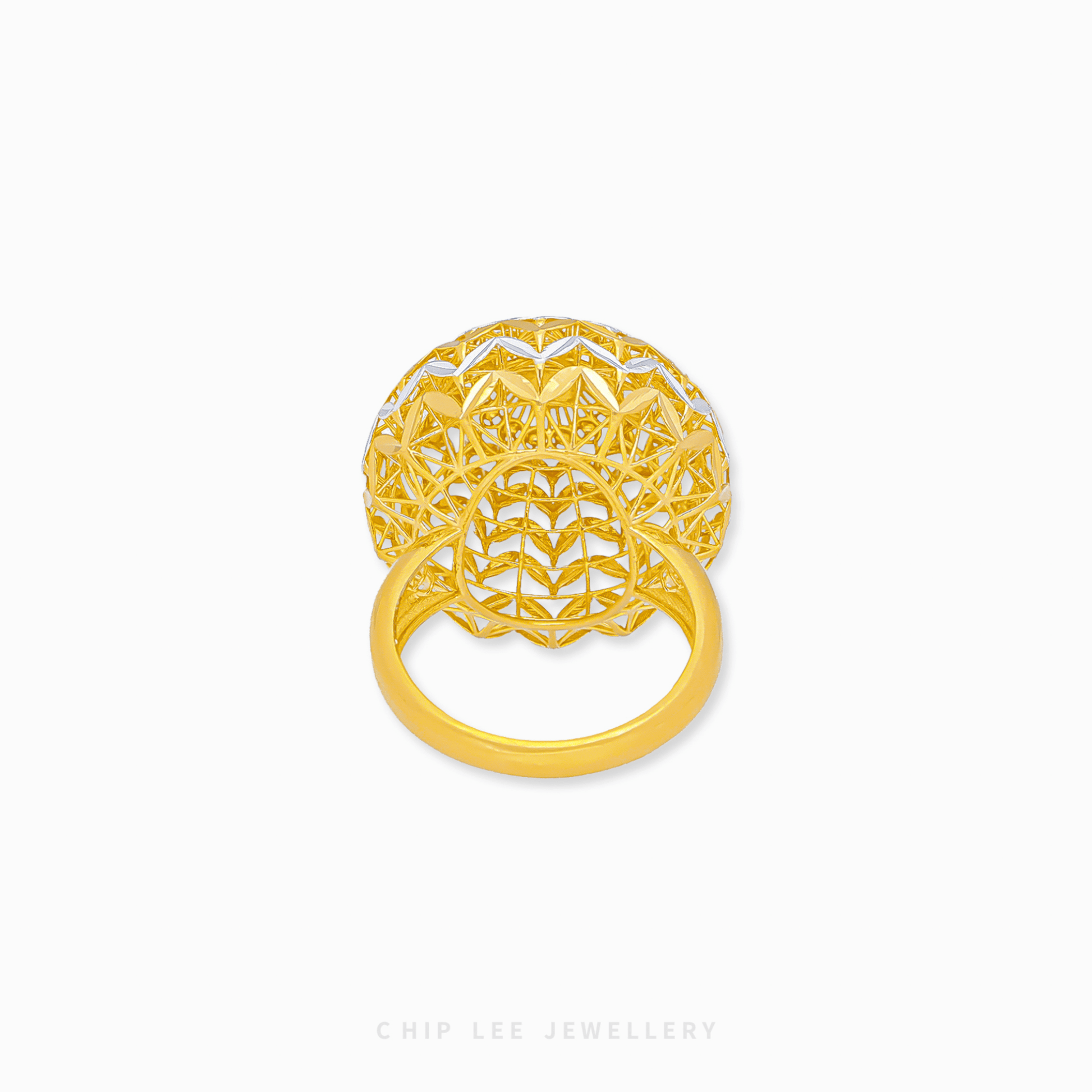 Bold Oracle Ring with intricate detailing, polished gold textures, and a striking, contemporary design for women.