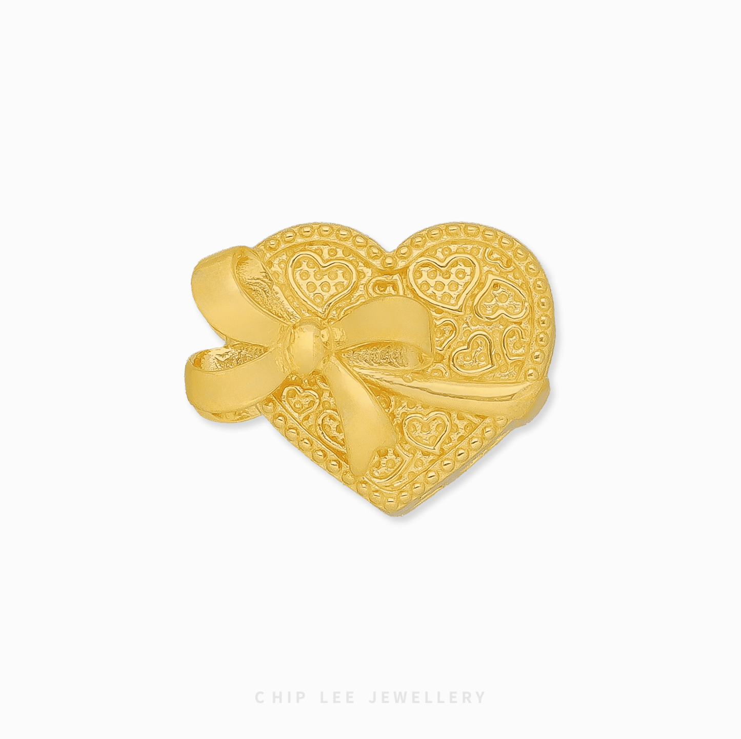 916 Gold Bow Heart Charm by Chip Lee Jewellery Singapore. Charming piece symbolizing affection, love, and the joy of giving a gift.