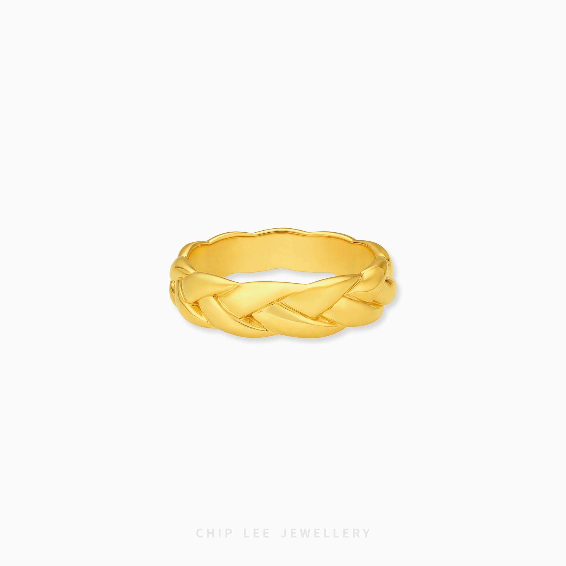 Braided ring in gold with woven textured design