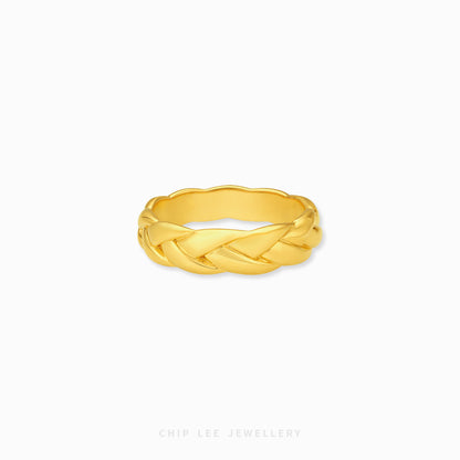 Braided ring in gold with woven textured design