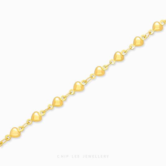 Bubble Hearts Baby Bracelet by Chip Lee Jewellery, 916 gold, featuring bubble-shaped heart links, symbolizing love and protection for newborns.