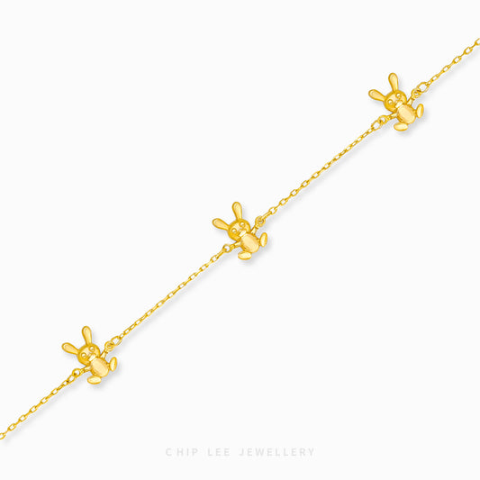 Bunny Trio Baby Bracelet by Chip Lee Jewellery, 916 gold, featuring three bunny charms, symbolizing joy and protection for newborns.