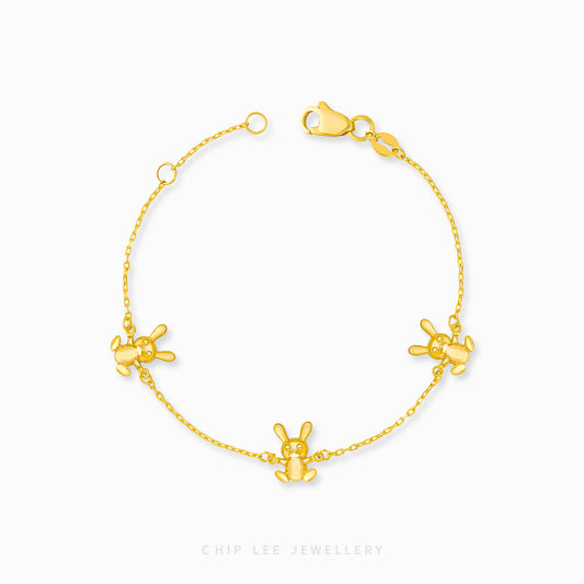 Bunny Trio Baby Bracelet by Chip Lee Jewellery, 916 gold, featuring three bunny charms, symbolizing joy and protection for newborns.
