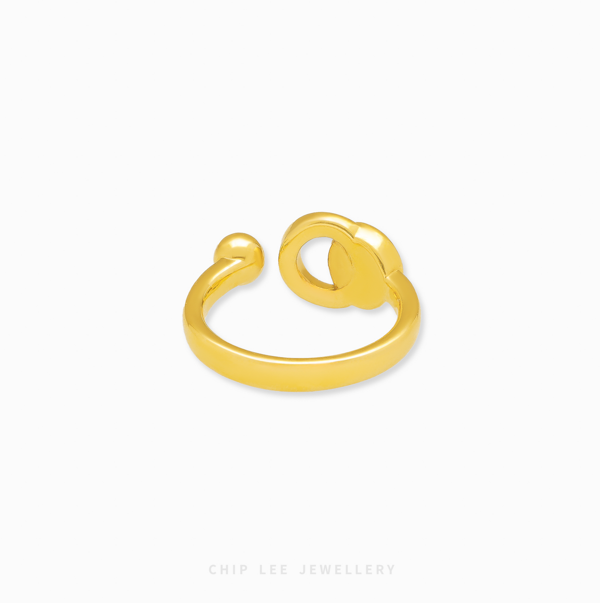 Gold ring with a minimalist design on a white background, featuring the brand 'Chip Lee Jewellery'.
