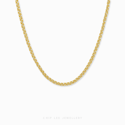 Celeste Necklace with intricate dual-tone links, elegant women’s jewelry for everyday wear or special occasions