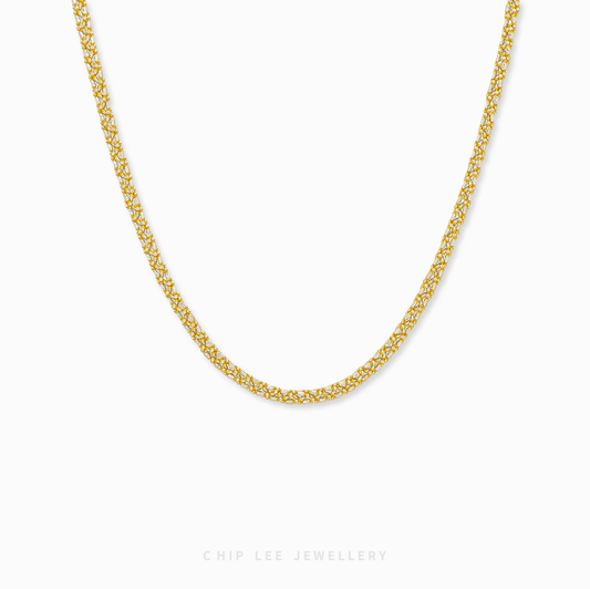 Celeste Necklace with intricate dual-tone links, elegant women’s jewelry for everyday wear or special occasions