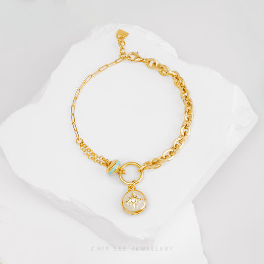 Celestial Compass Bracelet in solid 916 gold, featuring a compass charm, hallmarked for certified purity and everyday elegance.