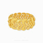 A wide gold chain bracelet with textured chevron links, displayed on a clean white background with a brand watermark at the bottom.