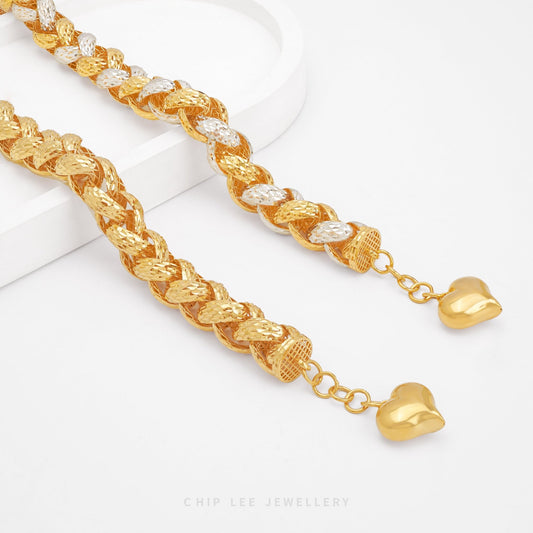 Discover the Chunky Heart Charm Bracelet by Chip Lee Jewellery – certified 916 gold, bold link design with heart charms, crafted in Singapore for modern luxe.