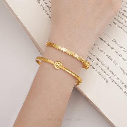Circle Ring Bangle by Chip Lee Jewellery Singapore, 916/22K gold, minimalist circular design, modern fusion of ring and bangle, timeless elegance accessory.