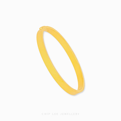 Classic Bangle by Chip Lee Jewellery Singapore, 916/22K gold, sleek minimalist design, versatile accessory for daily wear or gifting.