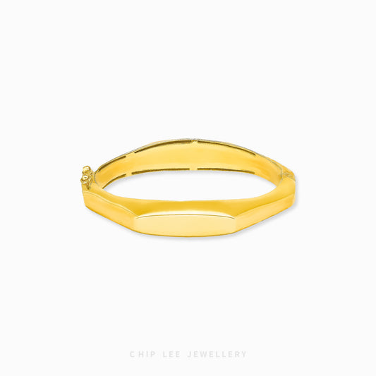 Classic Octagon Bangle by Chip Lee Jewellery Singapore, 916/22K gold with faceted edges, geometric elegance and bold luxury accessory