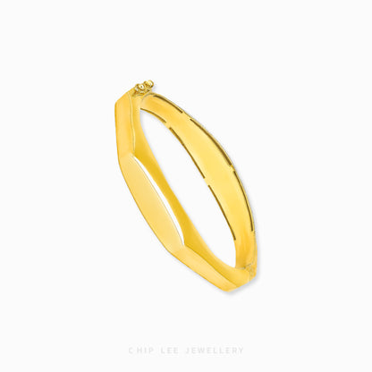 Classic Octagon Bangle by Chip Lee Jewellery Singapore, 916/22K gold with faceted edges, geometric elegance and bold luxury accessory