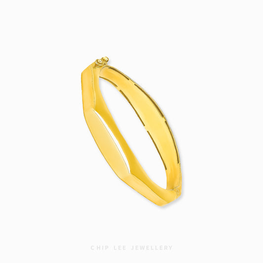 Classic Octagon Bangle by Chip Lee Jewellery Singapore, 916/22K gold with faceted edges, geometric elegance and bold luxury accessory