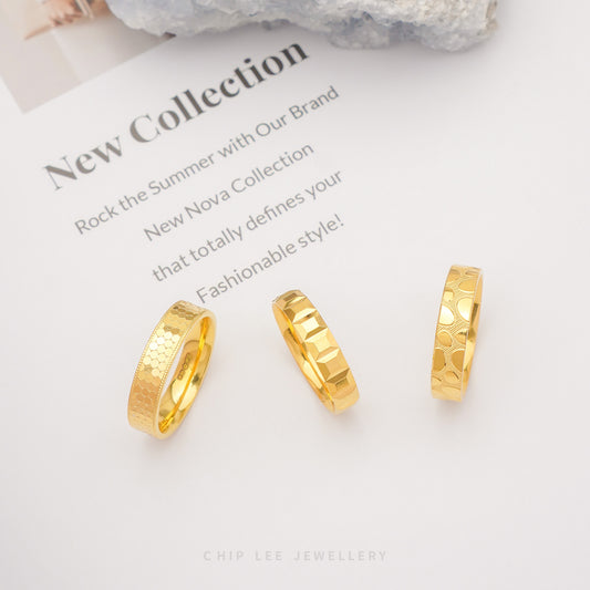 Classic solid gold ring set with geometric cube-style facets band in 916 gold by Chip Lee Jewellery Singapore