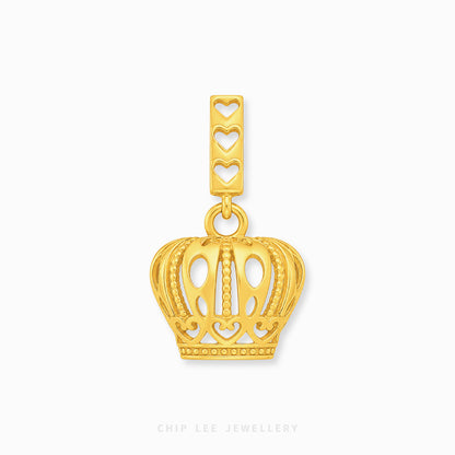 A gold crown-shaped pendant charm with a rectangular top bar featuring three heart cutouts, shown on a clean white background with a faint Chip Lee Jewellery watermark at the bottom.
