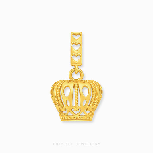 A gold crown-shaped pendant charm with a rectangular top bar featuring three heart cutouts, shown on a clean white background with a faint Chip Lee Jewellery watermark at the bottom.