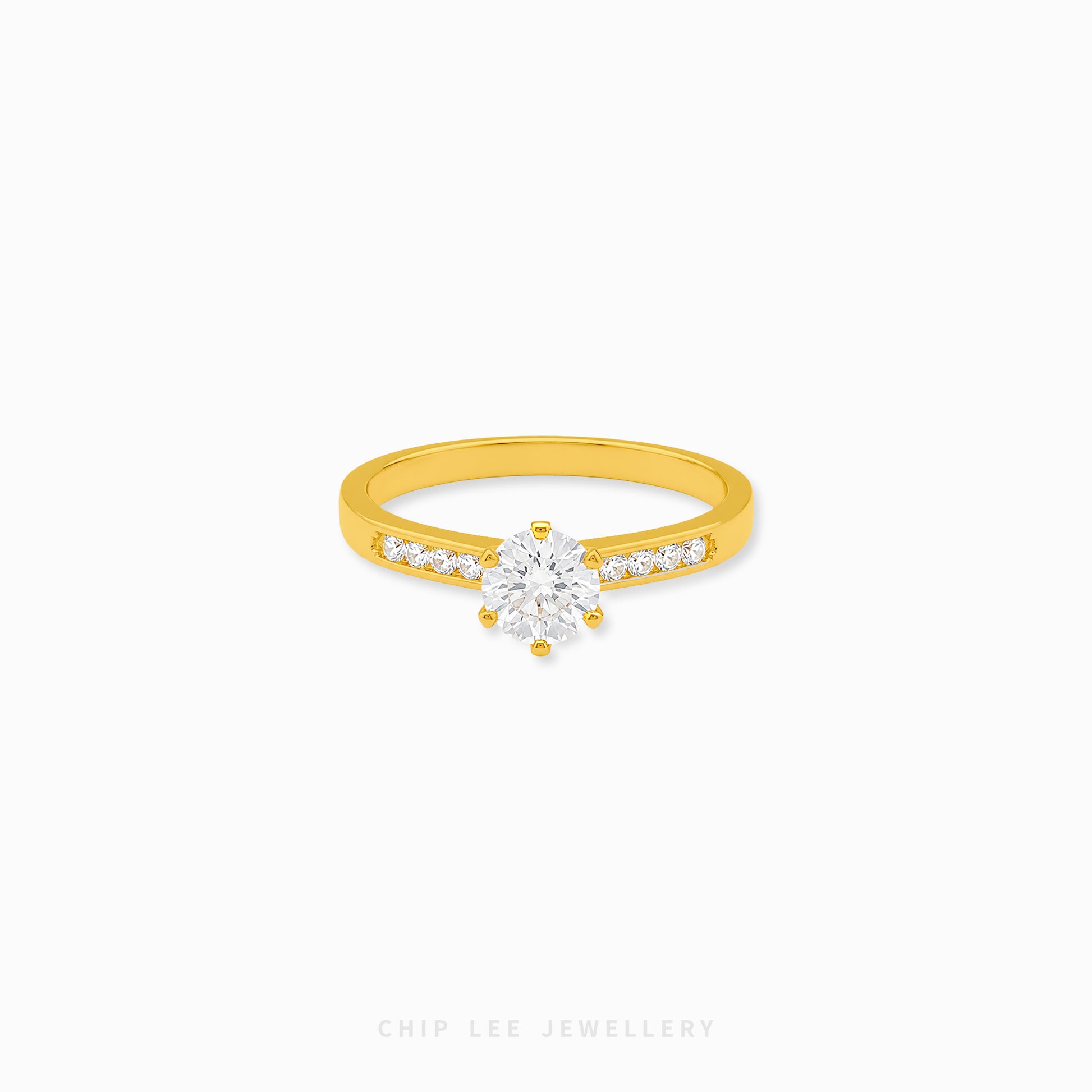 Cubic Zirconia pavé solitaire ring featuring a brilliant round-cut centre stone with sparkling shoulder-set stones on a polished gold band.
