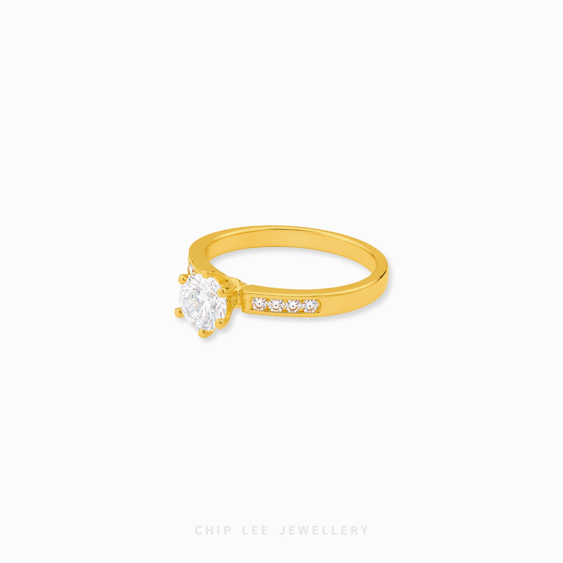 Cubic Zirconia pavé solitaire ring featuring a brilliant round-cut centre stone with sparkling shoulder-set stones on a polished gold band.