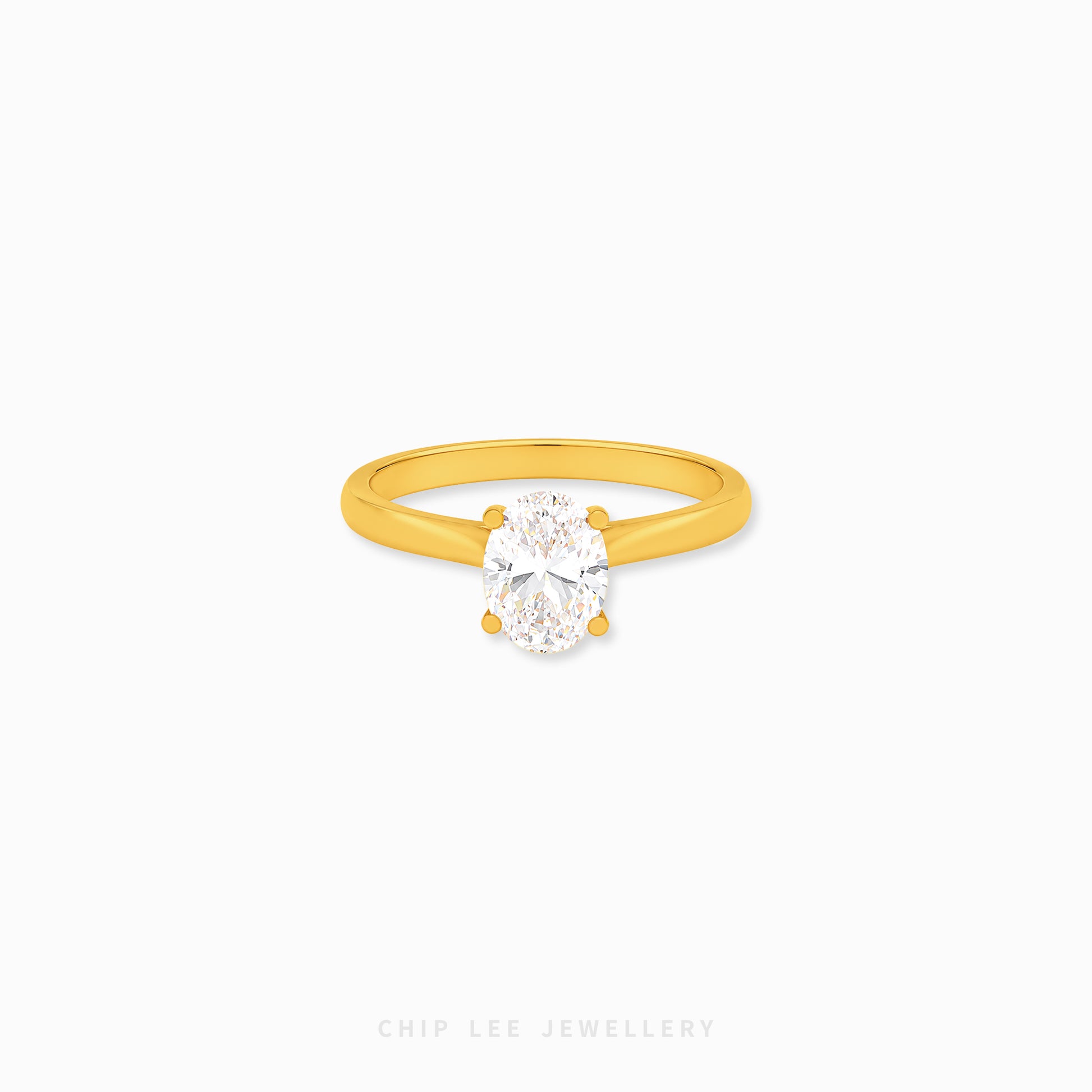 Oval Cubic Zirconia Solitaire Ring with a brilliant oval-cut stone on a polished gold band.