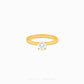 999 Gold Cubic Zirconia Solitaire Ring featuring a brilliant round-cut cubic zirconia on a polished yellow gold band.