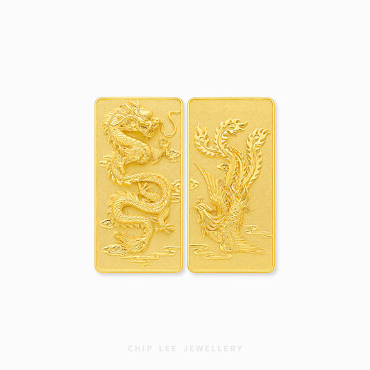 999 fine gold bar featuring an intricate Dragon and Phoenix relief design, symbolizing harmony, prosperity, and everlasting love, set against a textured gold background.