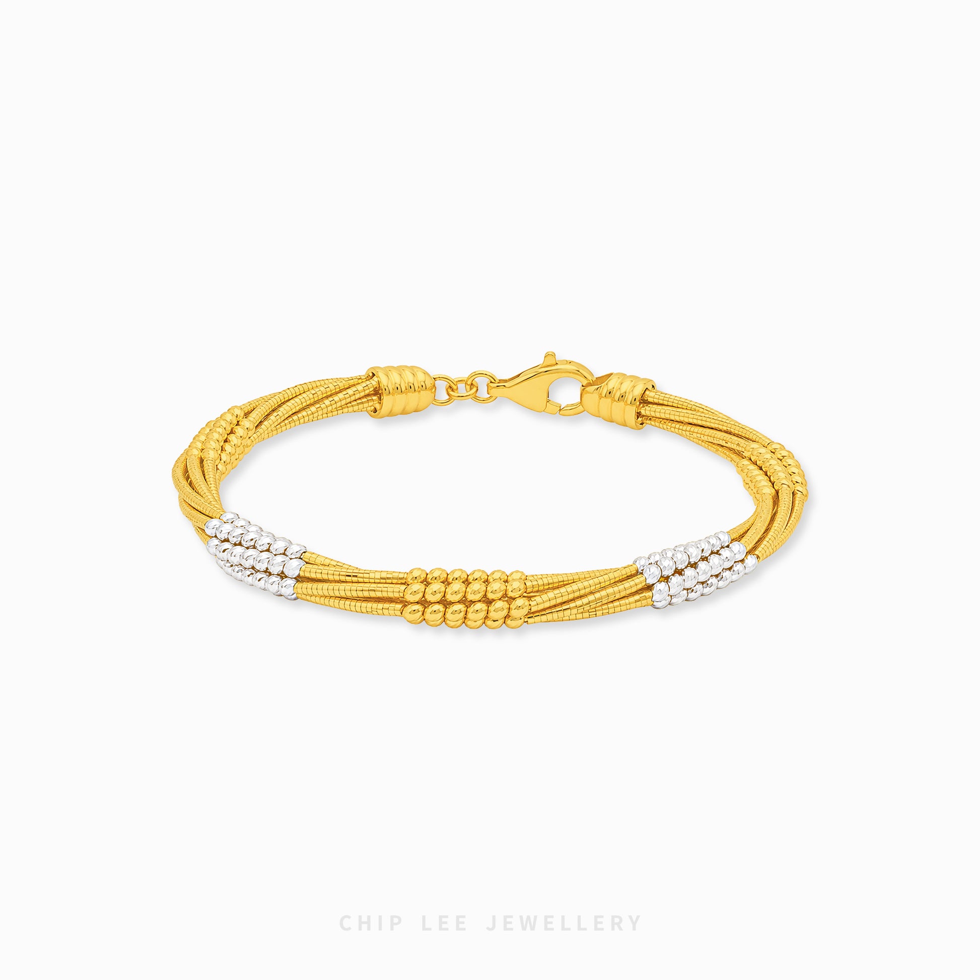A gold multi-strand snake chain bracelet with silver beaded accents and a lobster clasp, shown on a light gray background with a Chip Lee Jewellery watermark.