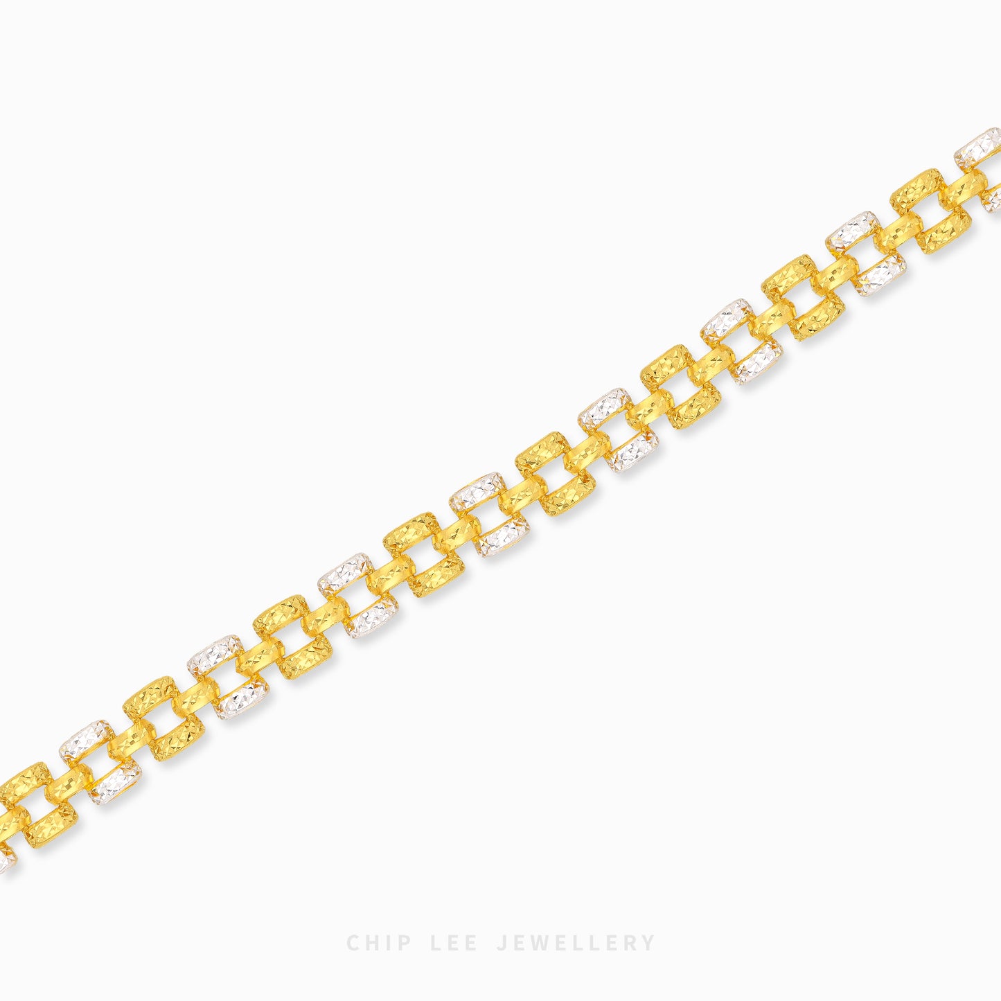 A gold link bracelet with alternating textured yellow-gold links and clear crystal links, displayed on a clean white background with a brand watermark at the bottom.