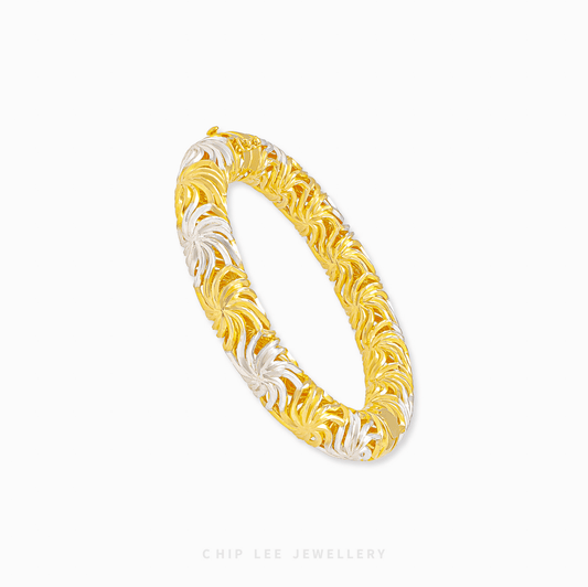 Duo Tone Cempaka Bangle in 916 gold featuring intricate floral carvings and a polished two-tone finish for elegance.