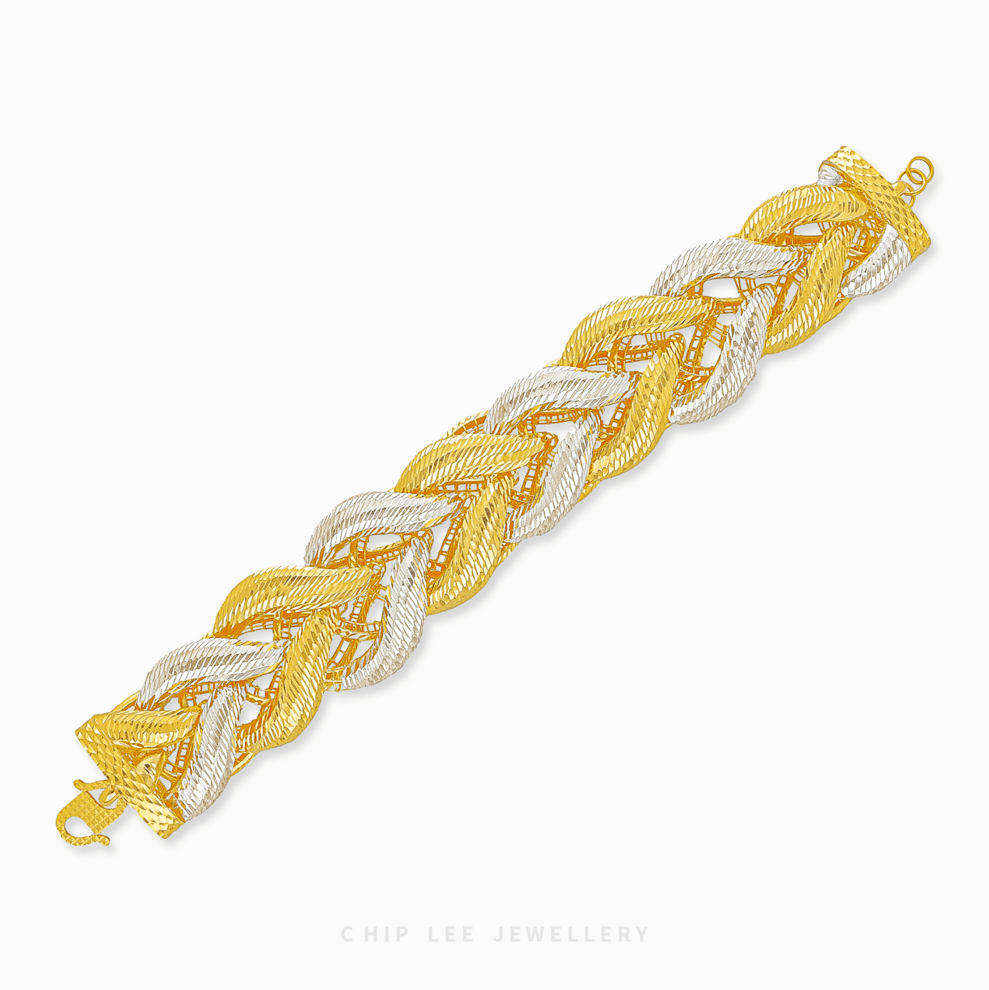 Gold and silver braided bracelet on a white background