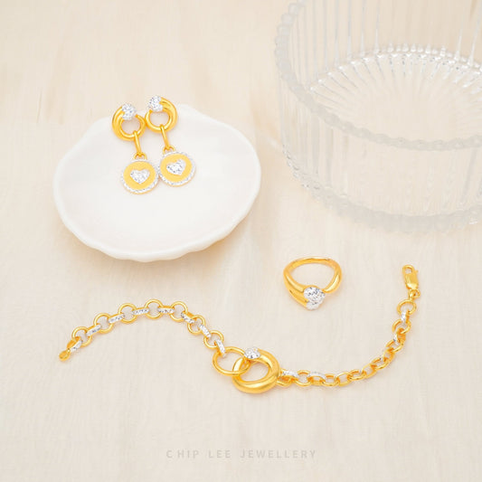 Duo Tone Circle Heart Set with interlocking matte and high-polish gold elements in 916 gold by Chip Lee Jewellery Singapore