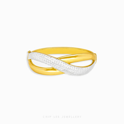 Duo Tone Crossover Bangle by Chip Lee Jewellery Singapore, sculpted 916 gold with matte and high-polish finishes, bold and elegant accessory