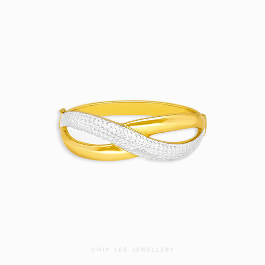Duo Tone Crossover Bangle by Chip Lee Jewellery Singapore, sculpted 916 gold with matte and high-polish finishes, bold and elegant accessory